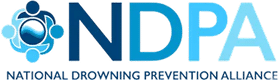 A blue logo with four figures surrounding a water wave, and the text "NDPA NATIONAL DROWNING PREVENTION ALLIANCE".
